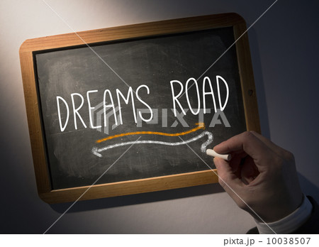 Hand writing Dreams road on chalkboard Hand writing Dreams road on chalkboard 10038507