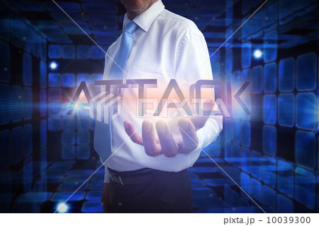Businessman presenting the word attack 10039300