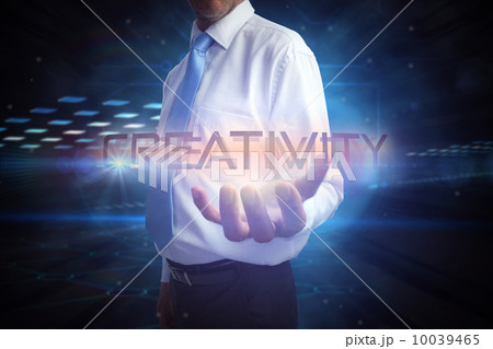 Businessman presenting the word creativity Businessman presenting the word creativity 10039465