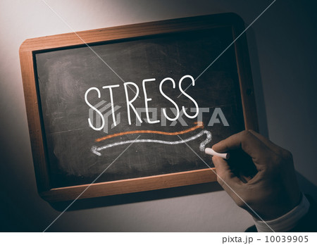 Hand writing Stress on chalkboard 10039905