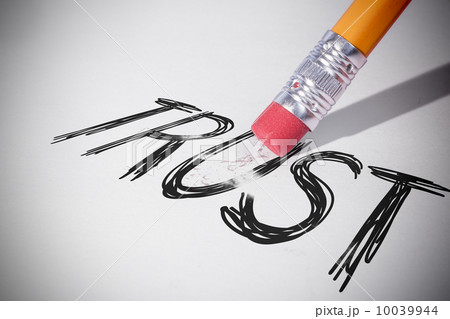 Pencil erasing the word Trust Pencil erasing the word Trust 10039944