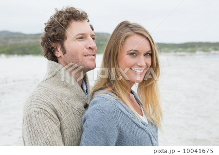 Relaxed romantic young couple at beach 10041675