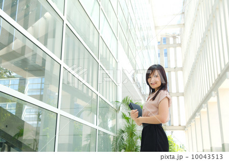 young asian business woman with office background 10043513