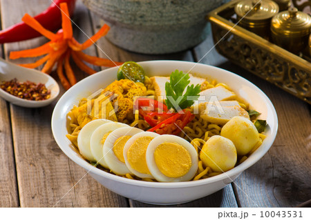 Hot and spicy Singapore Curry Noodle with decoration setup 10043531