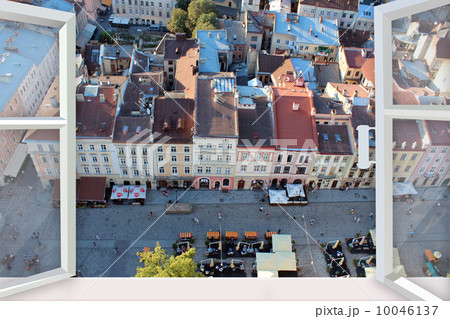 opened window to the roofs of city 10046137