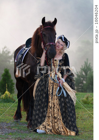 Woman in dress royal baroque riding Woman in dress royal baroque riding 10046204