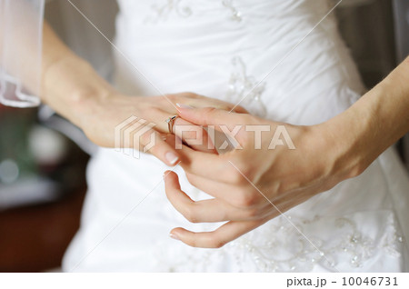 Bride's hands and a wedding or angagement ring Bride's hands and a wedding or angagement ring 10046731