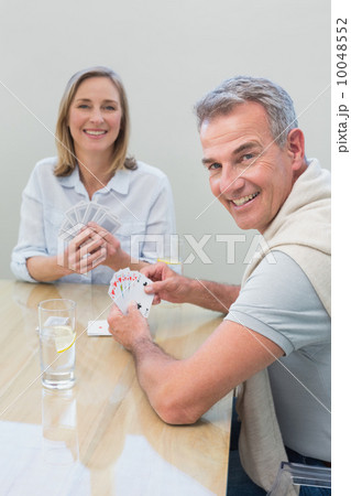 Couple playing cards at home 10048552
