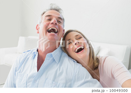 Close-up portrait of a cheerful couple Close-up portrait of a cheerful couple 10049300