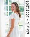 Portrait of a beautiful young woman at home 10051304