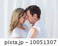 Loving young couple with eyes closed 10051307