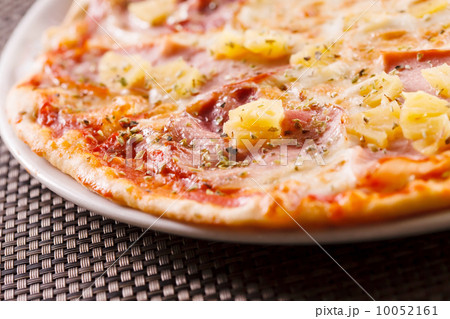 Pizza with pineapple and ham Pizza with pineapple and ham 10052161