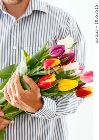 bouquet of tulips in a hand 10052515