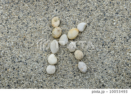 K - Letter alphabet stones laid out on the granite 10053493