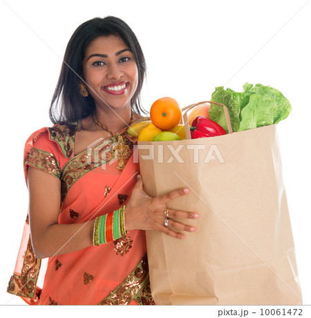 Indian woman having groceries shopping 10061472