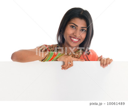 Indian woman holding blank placard 10061489