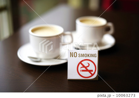 Two coffee cups and no smoking sign Two coffee cups and no smoking sign 10063273