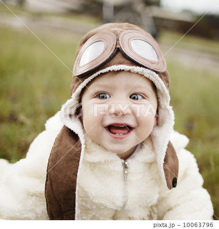 sweet little baby dreaming of being pilot 10063796