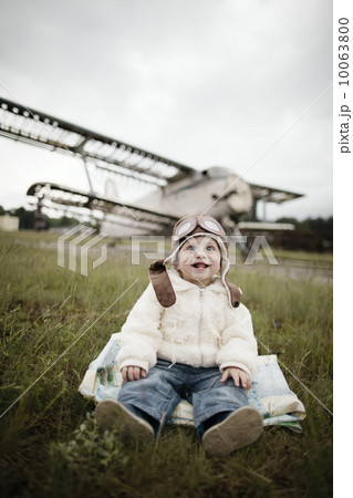 sweet little baby dreaming of being pilot 10063800
