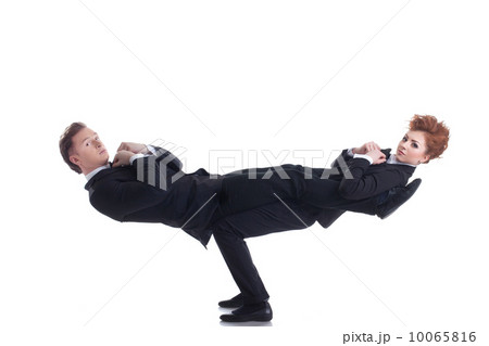 Flexible young people posing as businessmen Flexible young people posing as businessmen 10065816