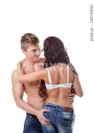 Portrait of enticing lovers embracing in studio Portrait of enticing lovers embracing in studio 10070692