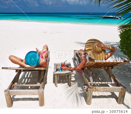 Couple on a beach at Maldives 10075614
