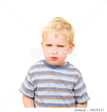 Angry and serious beautiful boy isolated on white 10076717