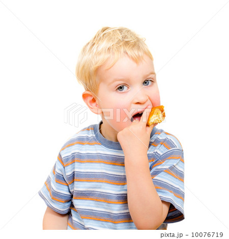 Cute little boy eating delicious cookie isolated on white 10076719