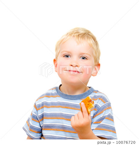 Cute little boy eating delicious cookie isolated on white 10076720