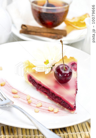 piece of cherry pie on a table in a restaurant 10079666