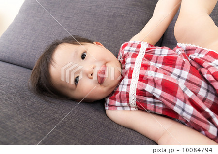 Asian baby girl making funny face Asian baby girl making funny face 10084794