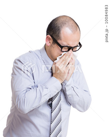 Businessman sneezes Businessman sneezes 10084983