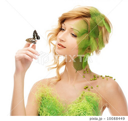 Dreaming young woman in conceptual spring costume with butterfly 10088449