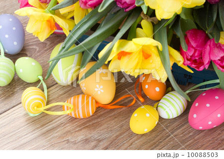 spring flowers bouquet with easter eggs  10088503