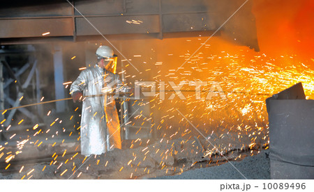mill worker with hot steel mill worker with hot steel 10089496