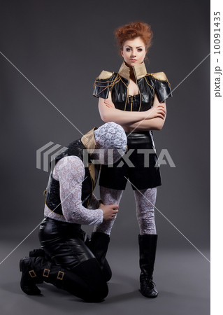 Couple of young contemporary artists go-go dance 10091435
