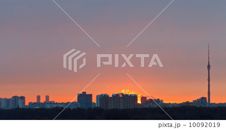 Early pink dawn over city in spring Early pink dawn over city in spring 10092019