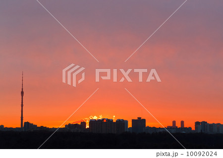 early red dawn over city 10092024
