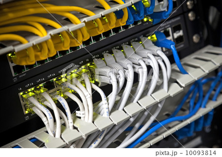 Large network hub and connected Internet cables. Selective focus 10093814