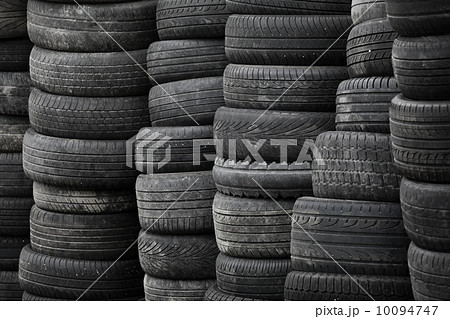 Old used stacked tires background Old used stacked tires background 10094747