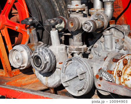 Water pump with hydrants. Firefighters Equipment of old fire truck Water pump with hydrants. Firefighters Equipment of old fire truck 10094903