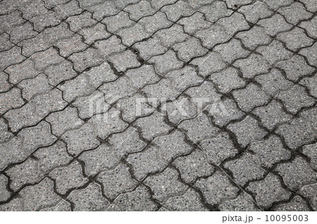 Background texture of gray urban cobblestone road Background texture of gray urban cobblestone road 10095003