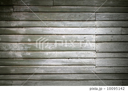 old green wall made of wooden lining boards 10095142