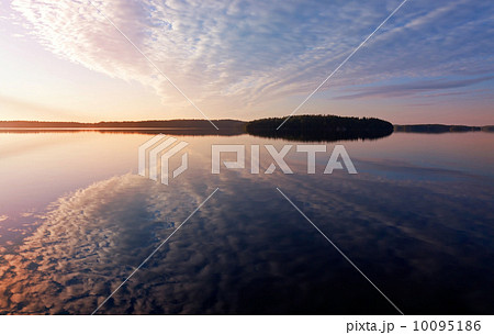 Colorful sunrise. Early morning on the Saimaa lake in Karelia, Finland 10095186