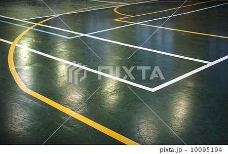 Green shining floor of sports hall with marking lines Green shining floor of sports hall with marking lines 10095194