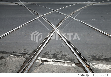 Transportation background with tramway crossing on gray asphalt urban road 10095521