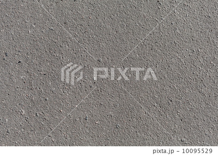 Close-up background texture of an asphalt road surface Close-up background texture of an asphalt road surface 10095529