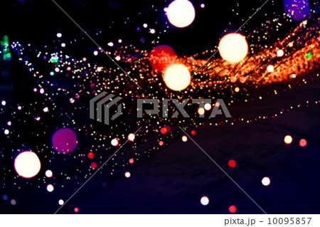 Abstract blurred background with orange garland lights bokeh in 10095857