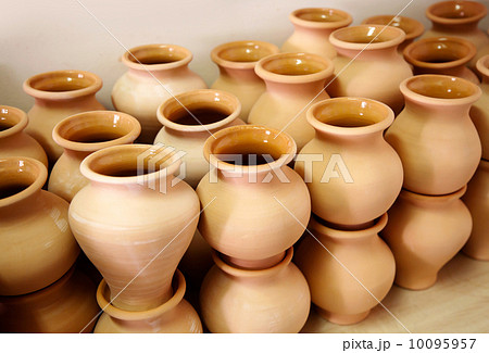 Pottery examples on the shelf in the art school 10095957