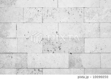 Gray stone wall closeup background photo texture Gray stone wall closeup background photo texture 10096050